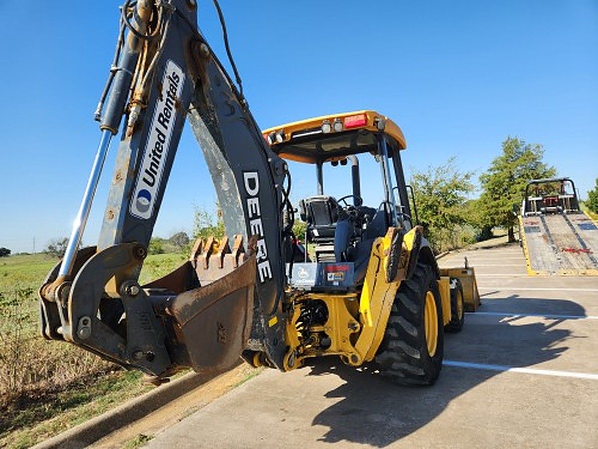 JOHN DEERE 310L photo 7