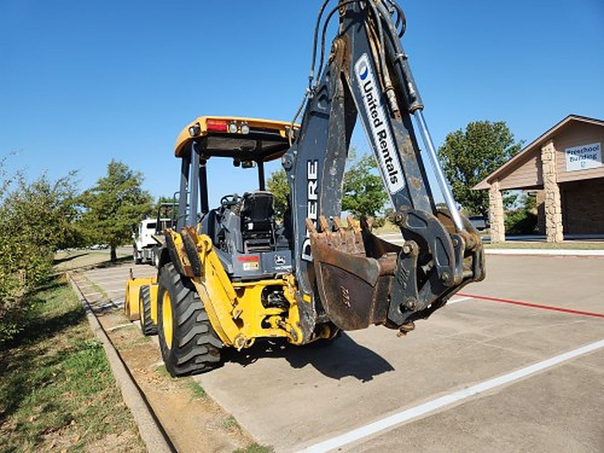 JOHN DEERE 310L photo 8