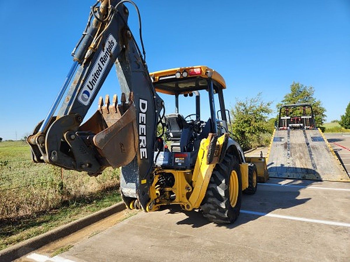 JOHN DEERE 310L photo 9
