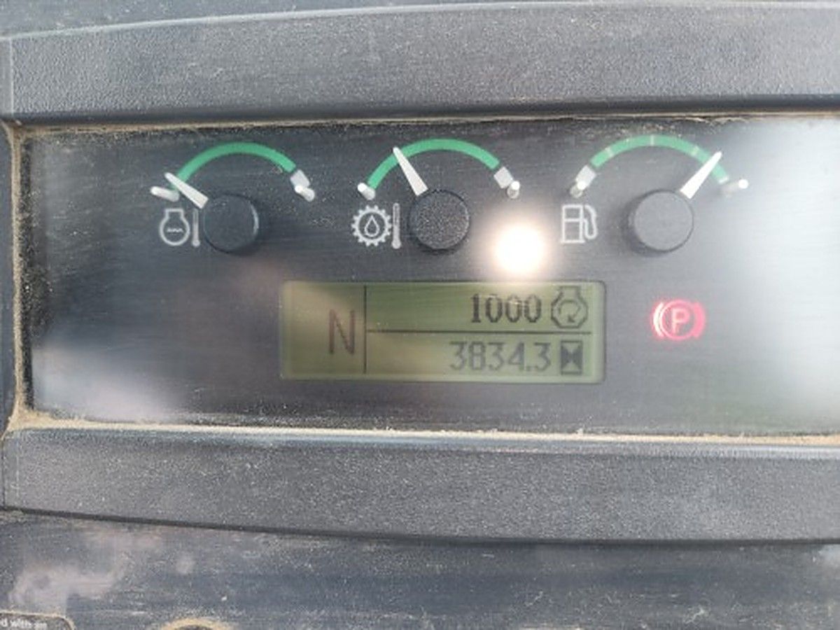 JOHN DEERE 710L photo 11
