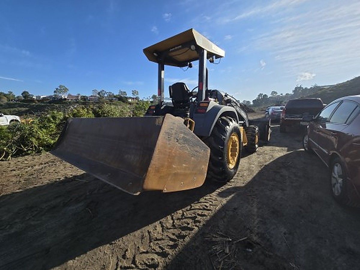 JOHN DEERE 210L EP photo 8