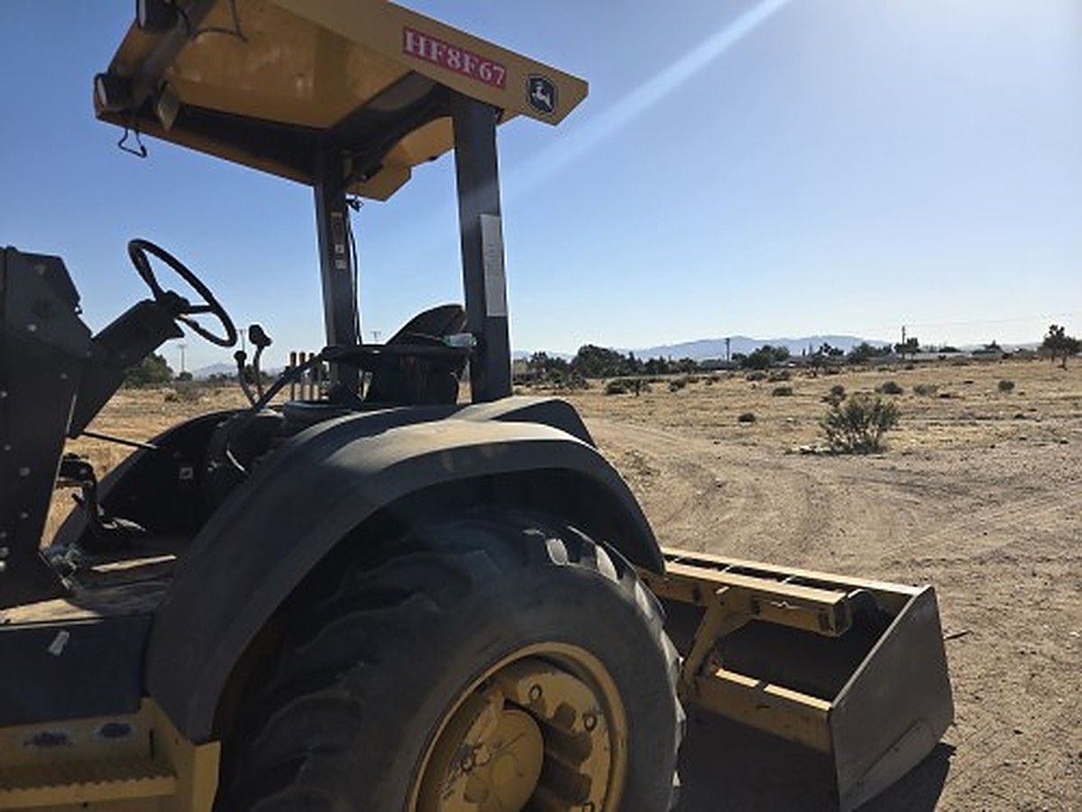 JOHN DEERE 210L EP photo 6