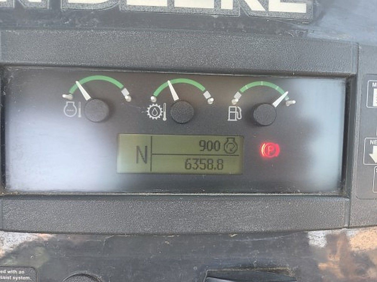 JOHN DEERE 710L photo 6