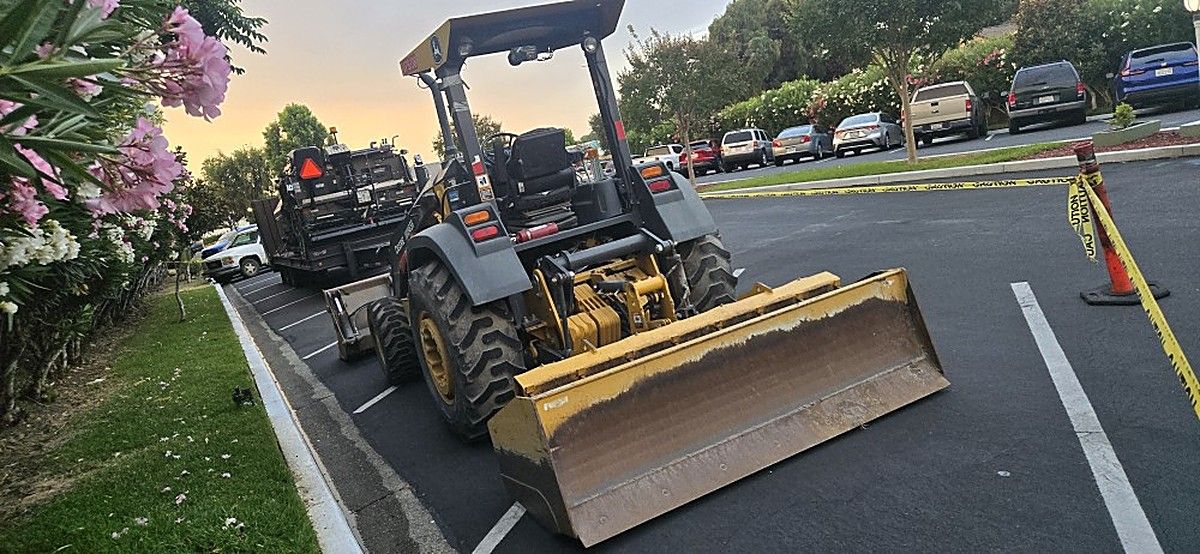 JOHN DEERE 210L EP photo 2