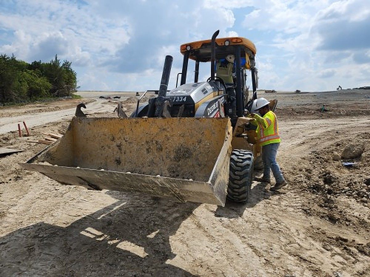 JOHN DEERE 310L EP II photo 3