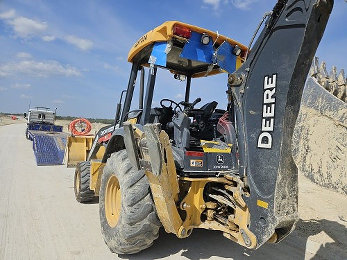 JOHN DEERE 310L EP II photo 9