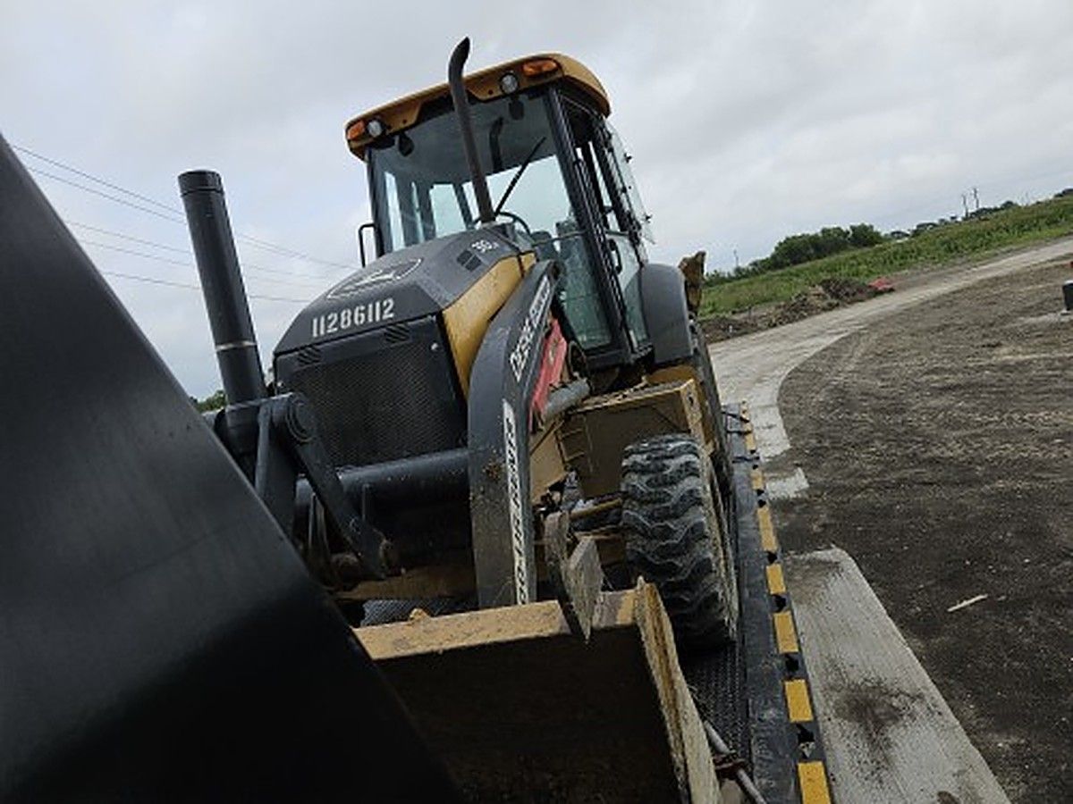JOHN DEERE 310L EP II photo 2