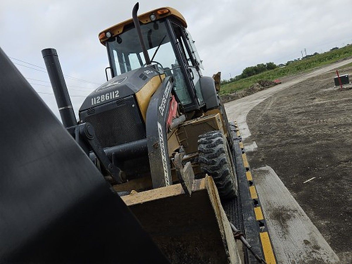 JOHN DEERE 310L EP II photo 4