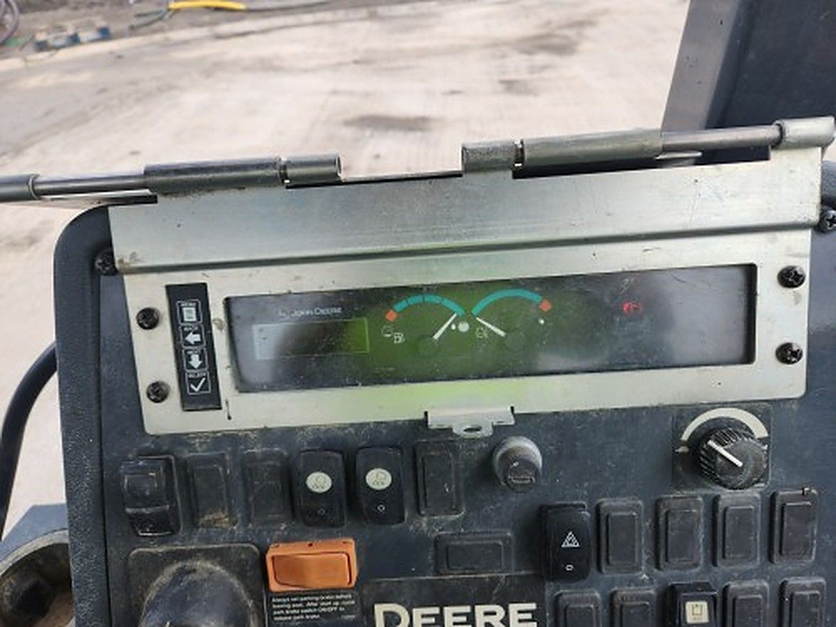 JOHN DEERE 310L EP II photo 4